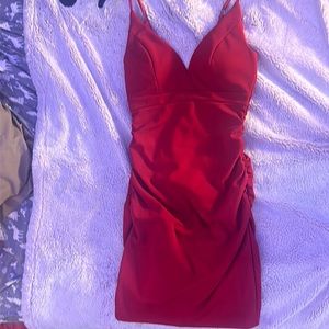 Red dress the brand is emerald sundae In a size small women’s never but no tags